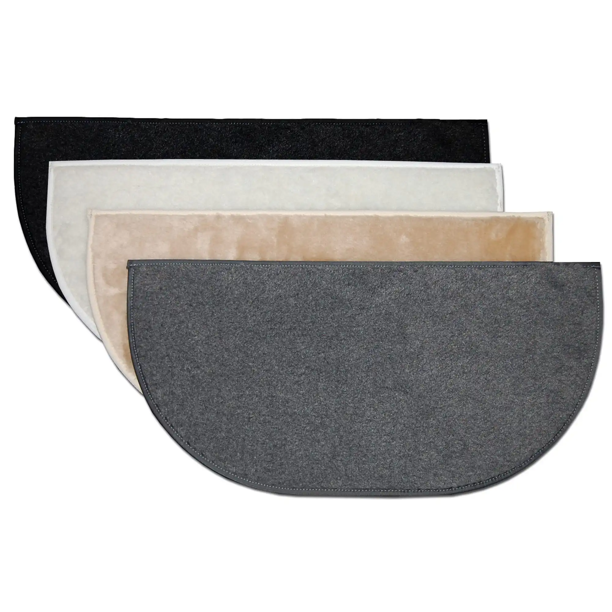 Four semi-circular doormats in black, white, beige, and gray overlap in a stack on a plain white background.