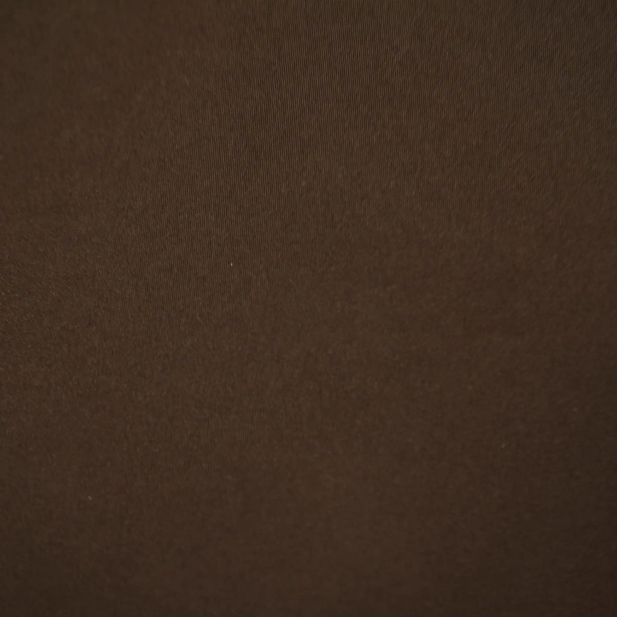 Close-up of KBB-COV-ES’s plain dark brown fabric, with a smooth, slightly textured surface typical in cat furniture.