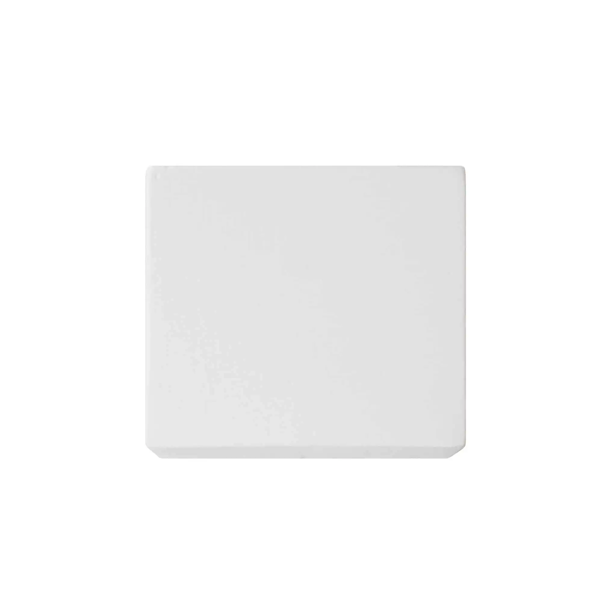 A sleek, square white object with smooth edges and a flat surface sits on a white background.